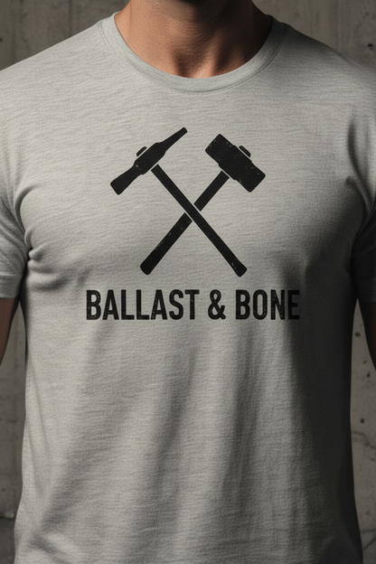 Zoomed-in crossed hammers design on heather dust t-shirt